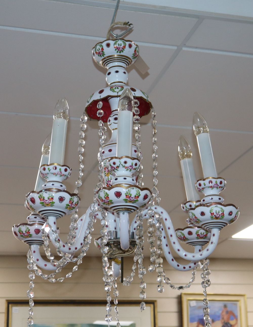 A Bohemian style white and ruby overlay glass six-light chandelier, drop approx. 50cm